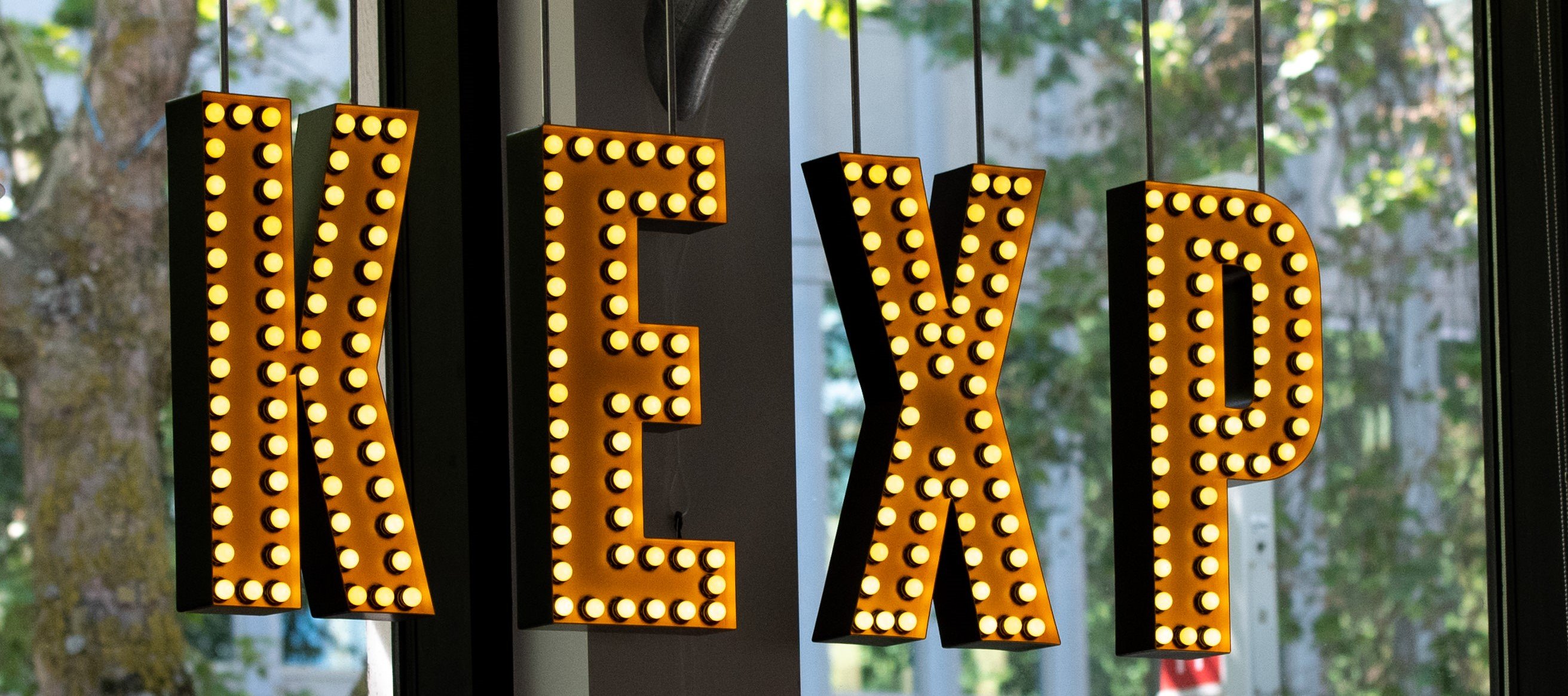 A vintage inspired sign reading "KEXP"